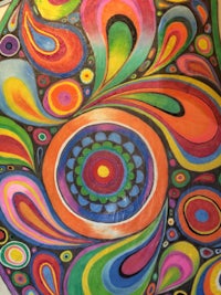 a colorful painting with swirls on it