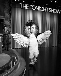 an owl mascot on the stage of the tonight show